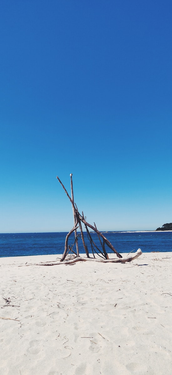 white sand under blue sky